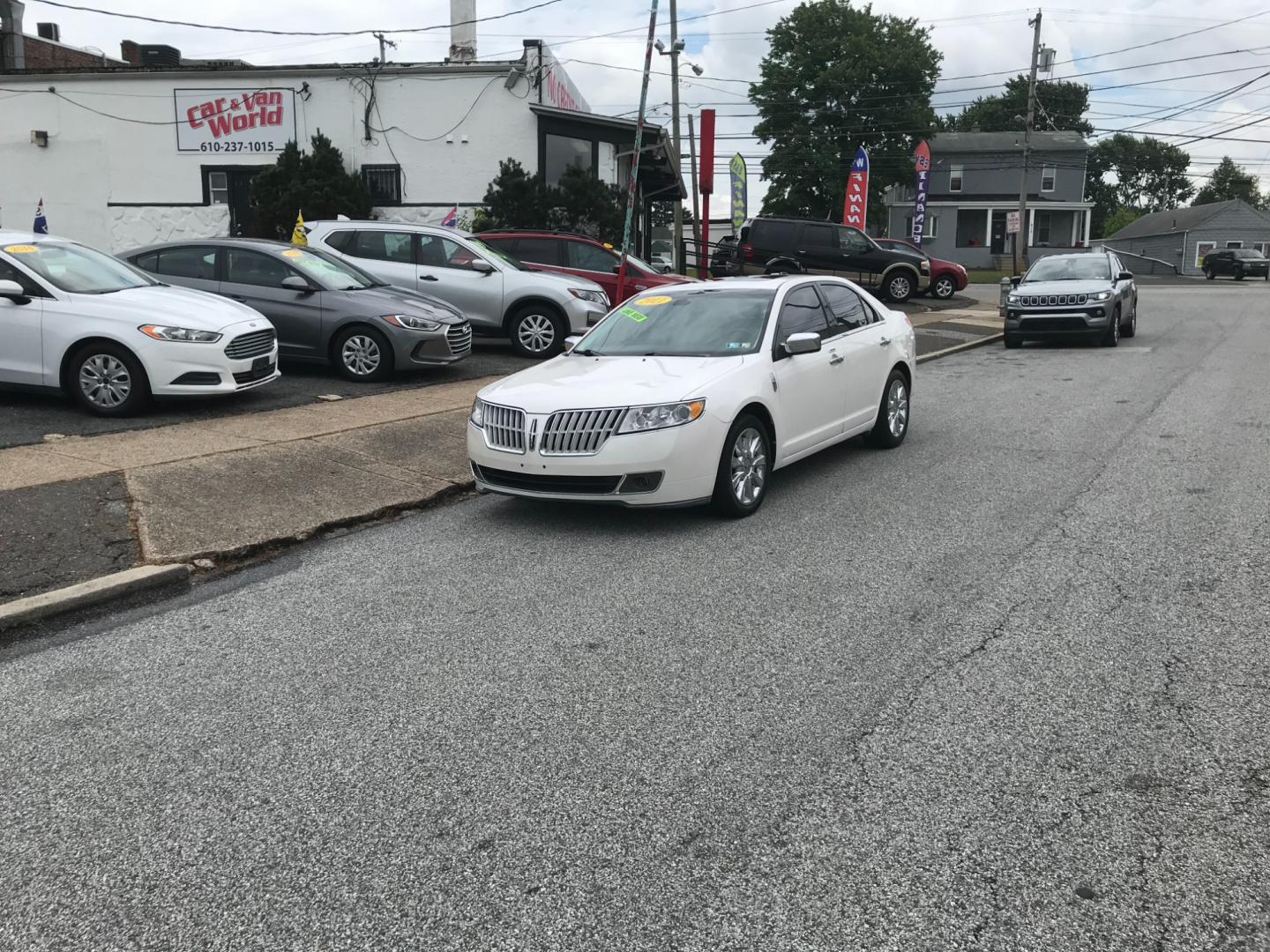 2011 White /Cream Lincoln MKZ (3LNHL2JC4BR) with an 3.5 V6 engine, Automatic transmission, located at 577 Chester Pike, Prospect Park, PA, 19076, (610) 237-1015, 39.886154, -75.302338 - Photo#1